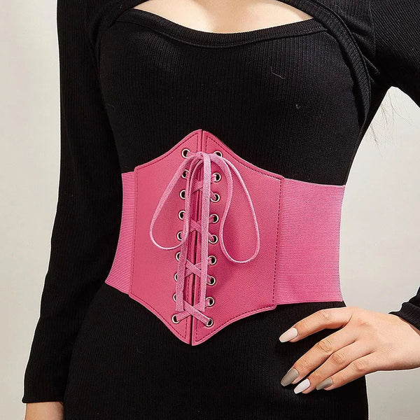 un corset rosa fucsia